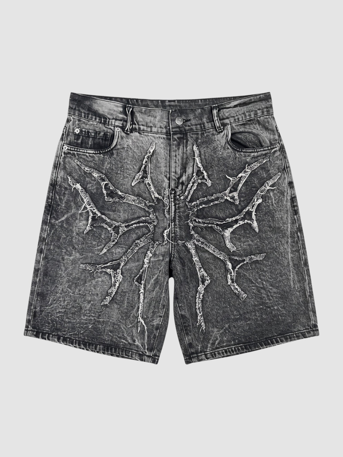 Y2K Studio acid wash black denim jorts featuring a distressed thorny star appliqué with raw frayed edges.