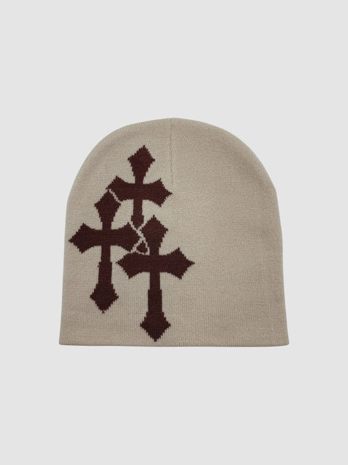 Y2K Studio beige knit beanie featuring a dark brown jacquard triple cross pattern with a subtle cracked design.