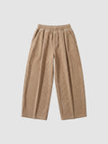 Y2K Studio beige wide-leg corduroy trousers with an elasticated waist and deep side pockets in a relaxed Y2K style.