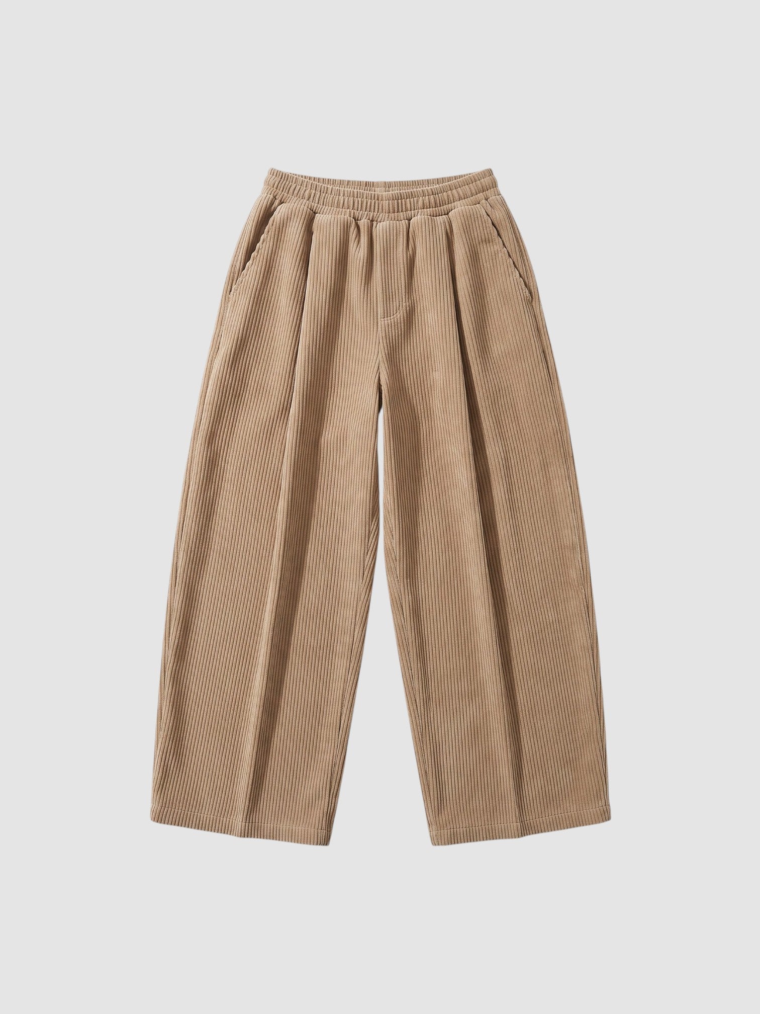 Y2K Studio beige wide-leg corduroy trousers with an elasticated waist and deep side pockets in a relaxed Y2K style.