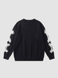 Y2K STUDIO black knit sweater featuring a white 3D-effect bone pattern on the sleeves and a crew neck design.