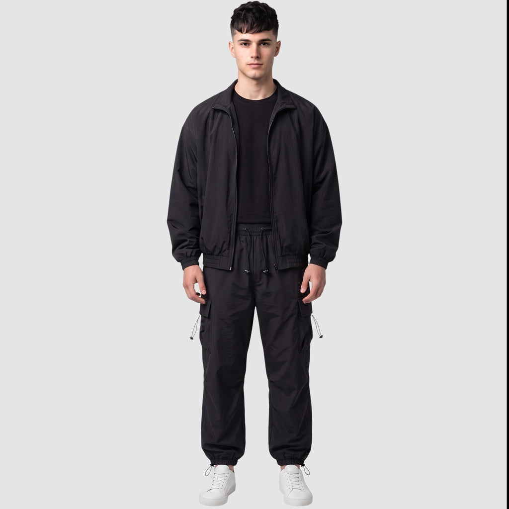 Y2K STUDIO men wearing black casual cargo pants with drawstring waist and side pockets paired with a matching jacket