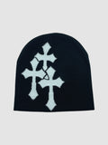 Y2K Studio black beanie featuring a white jacquard knit design of three gothic-style crosses.