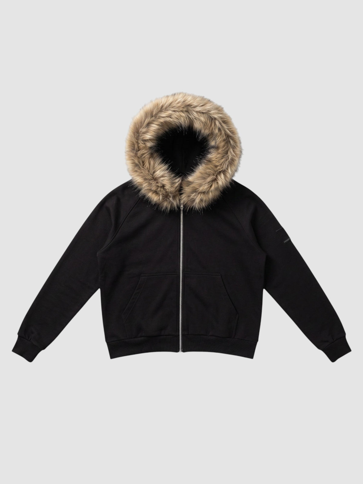 Y2K Studio black zip-up hoodie featuring a thick beige faux fur hood trim, ribbed cuffs, and a cropped fit.