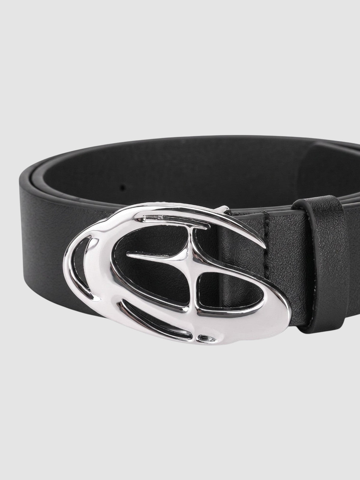 Y2K Studio black faux leather belt featuring a polished silver-tone oval buckle with a sculpted wave design.