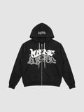 Y2K Studio black zip-up hoodie featuring white and grey bubble graffiti lettering and small green star accents.