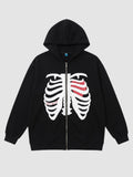 Y2K Studio black zip-up hoodie featuring a white skeleton rib cage print with a red heart detail on the chest.
