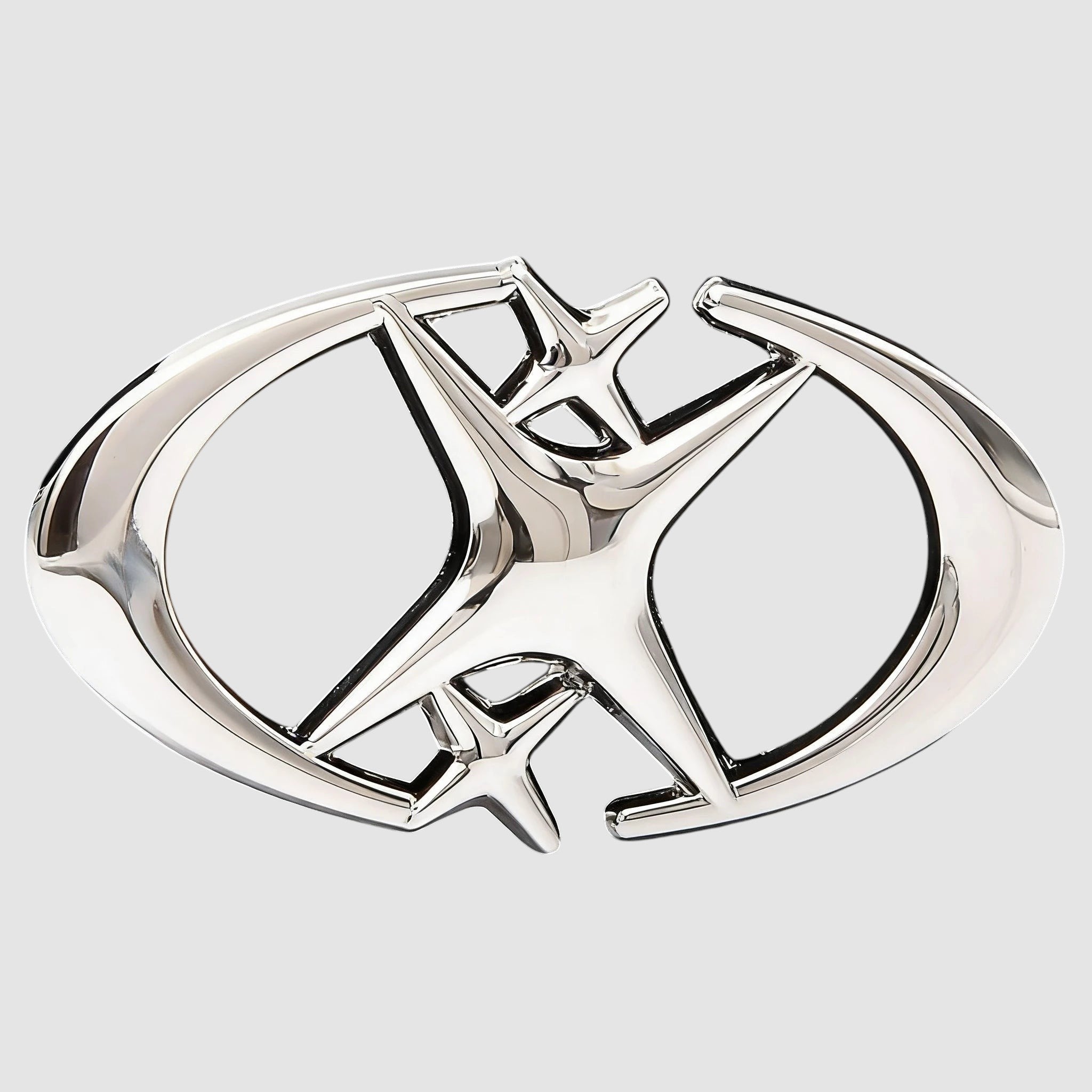 Y2K Studio black faux leather belt featuring a shiny silver star-shaped buckle with curved crescent blade details.