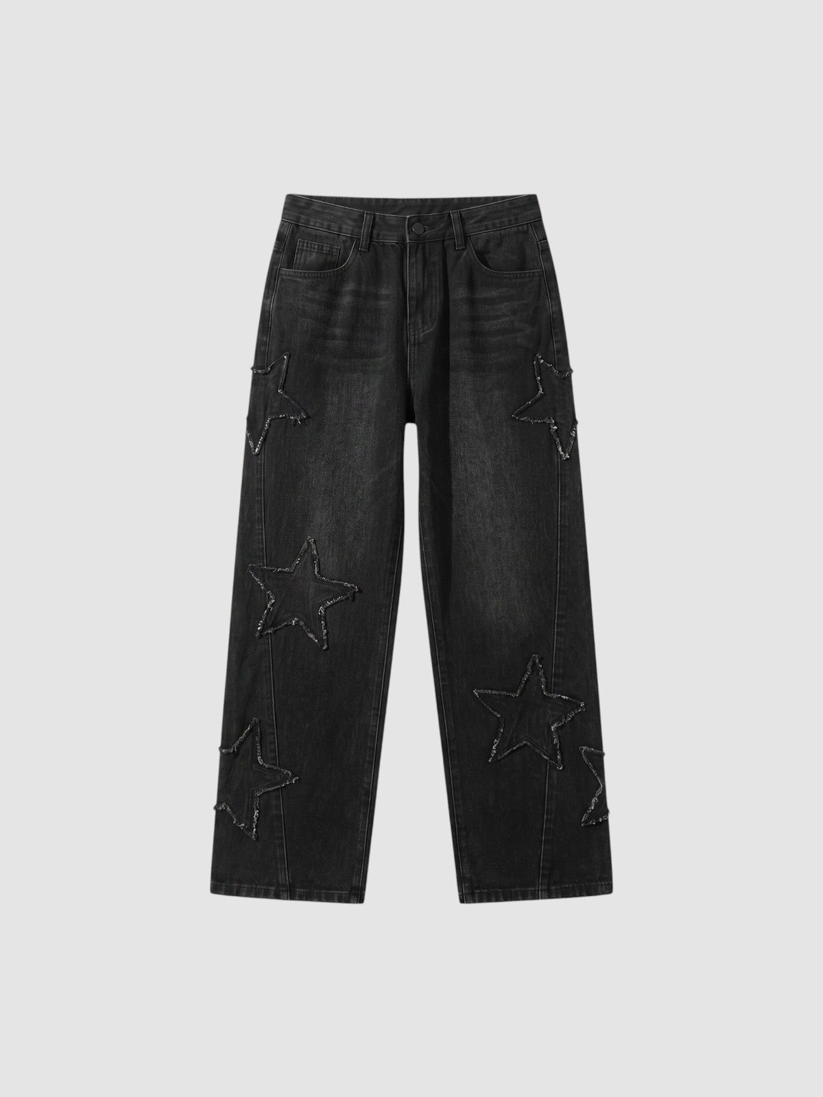 Y2K Studio black denim jeans featuring raw-edge stitched star appliqués in a regular fit with a button fly.