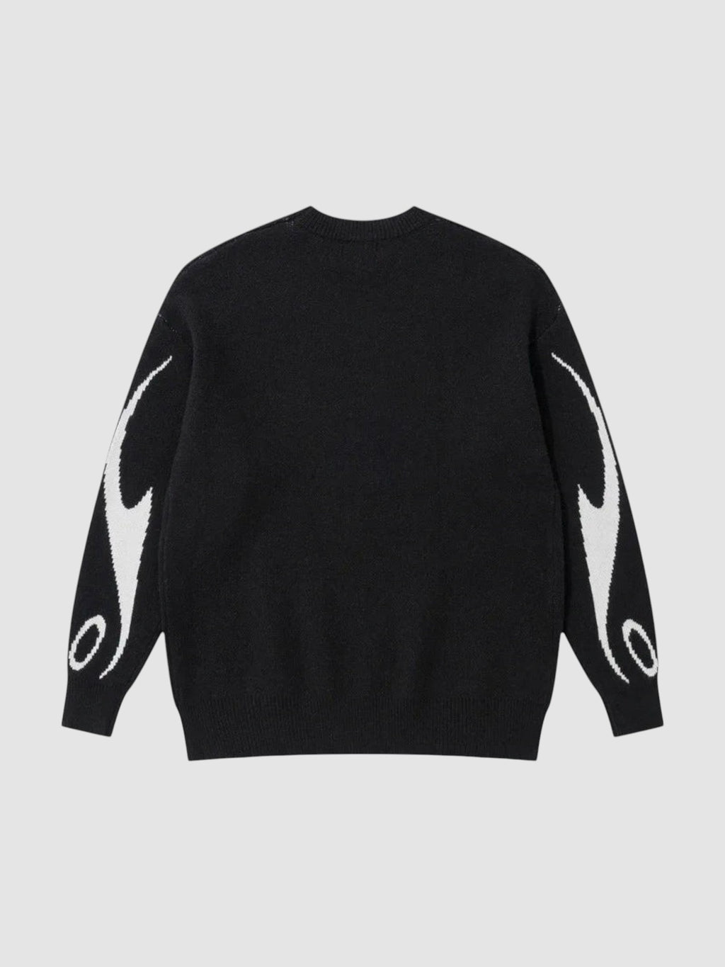 Y2K STUDIO black knit sweater with white flame motifs on the sleeves and a relaxed fit, back view.