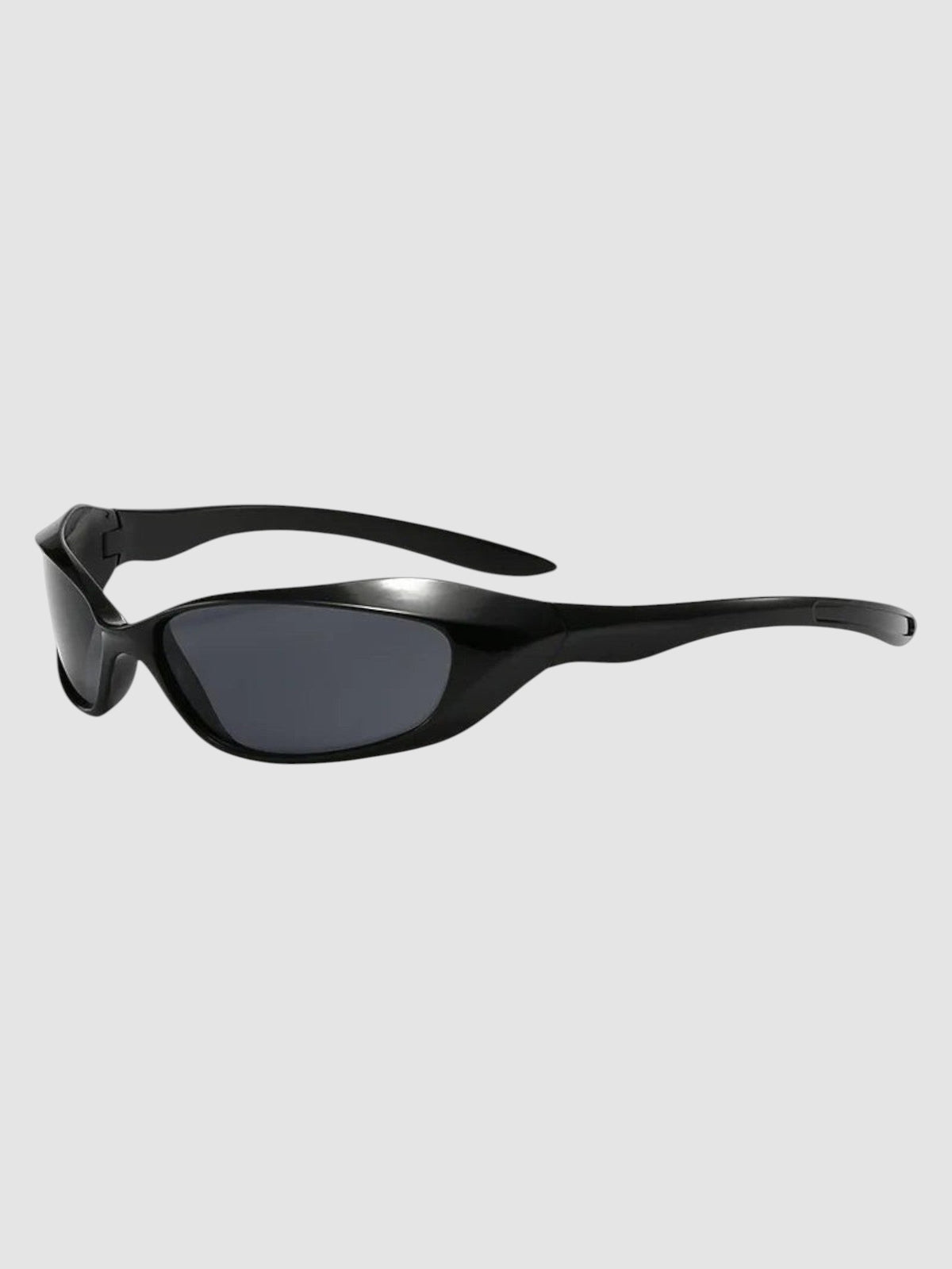 Y2K Studio black wraparound futuristic sunglasses with dark tinted lenses and a sleek polycarbonate frame