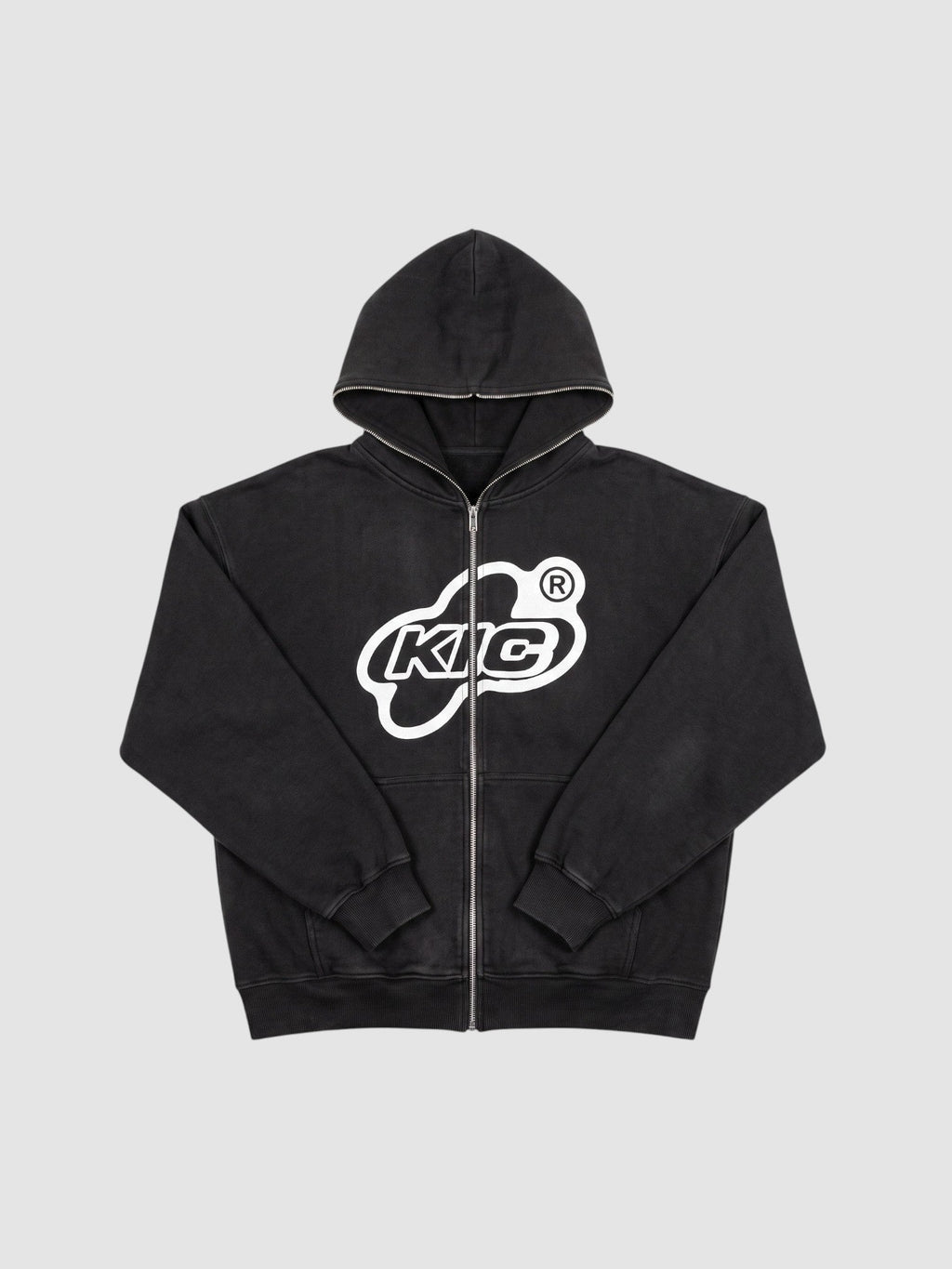 Y2K Studio black zip-up hoodie with white bubble logo, contrast piping on hood and zipper, and oversized fit.