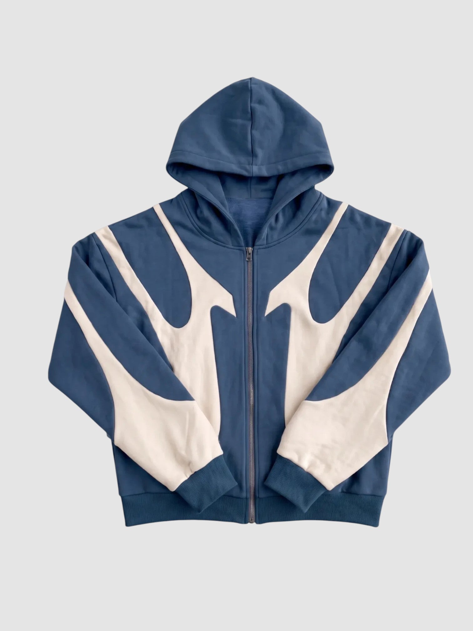 Y2K Studio blue and cream zip-up hoodie with stitched flame panels, boxy fit, and balloon sleeves in cotton-nylon.