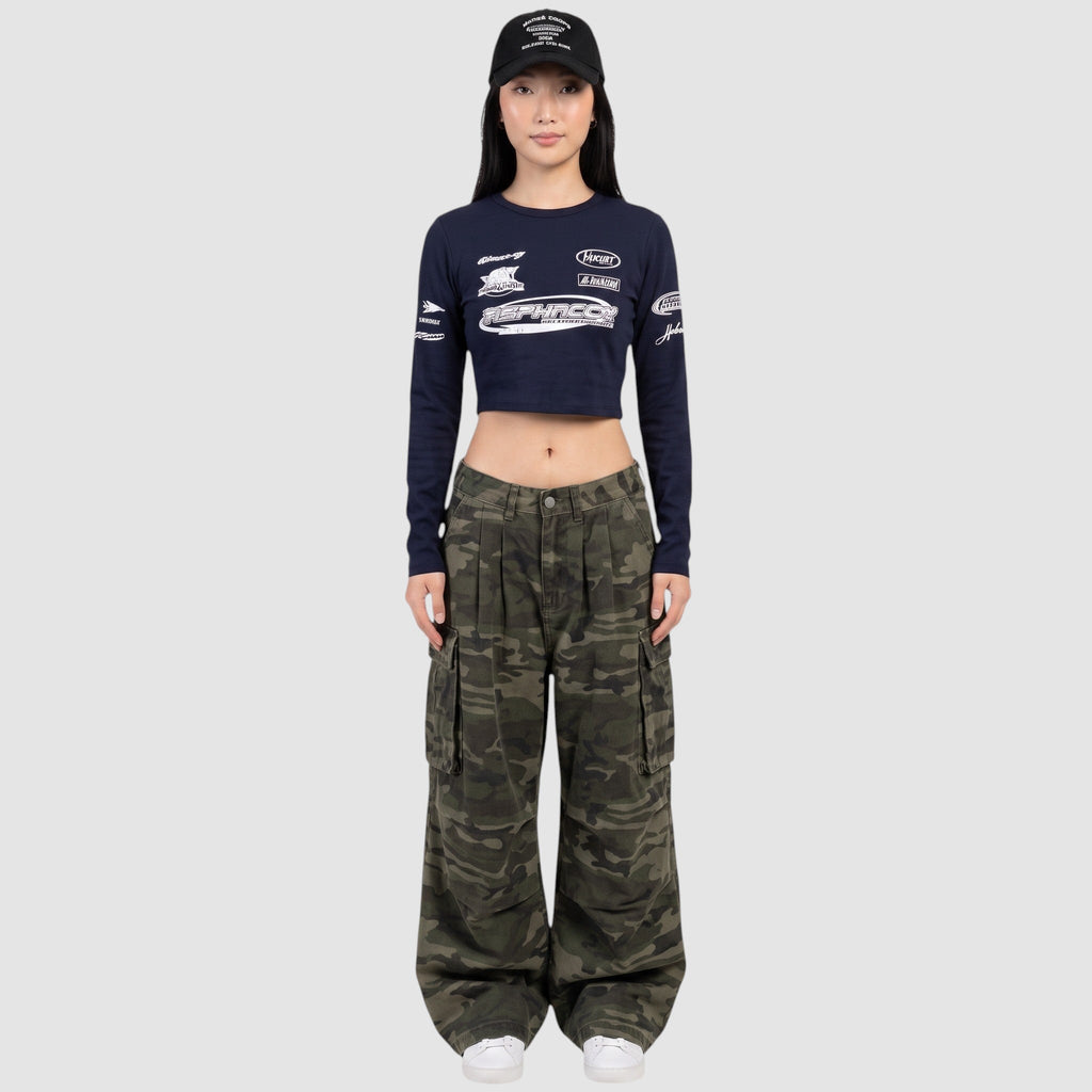 Y2K STUDIO high-waisted camouflage cargo pants with side pockets and wide-leg fit worn by a model