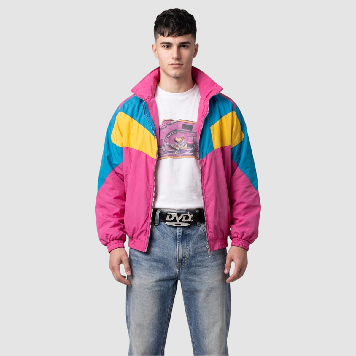 Y2K Studio black faux leather belt with silver DVD disc buckle worn by a man in a colorful retro windbreaker