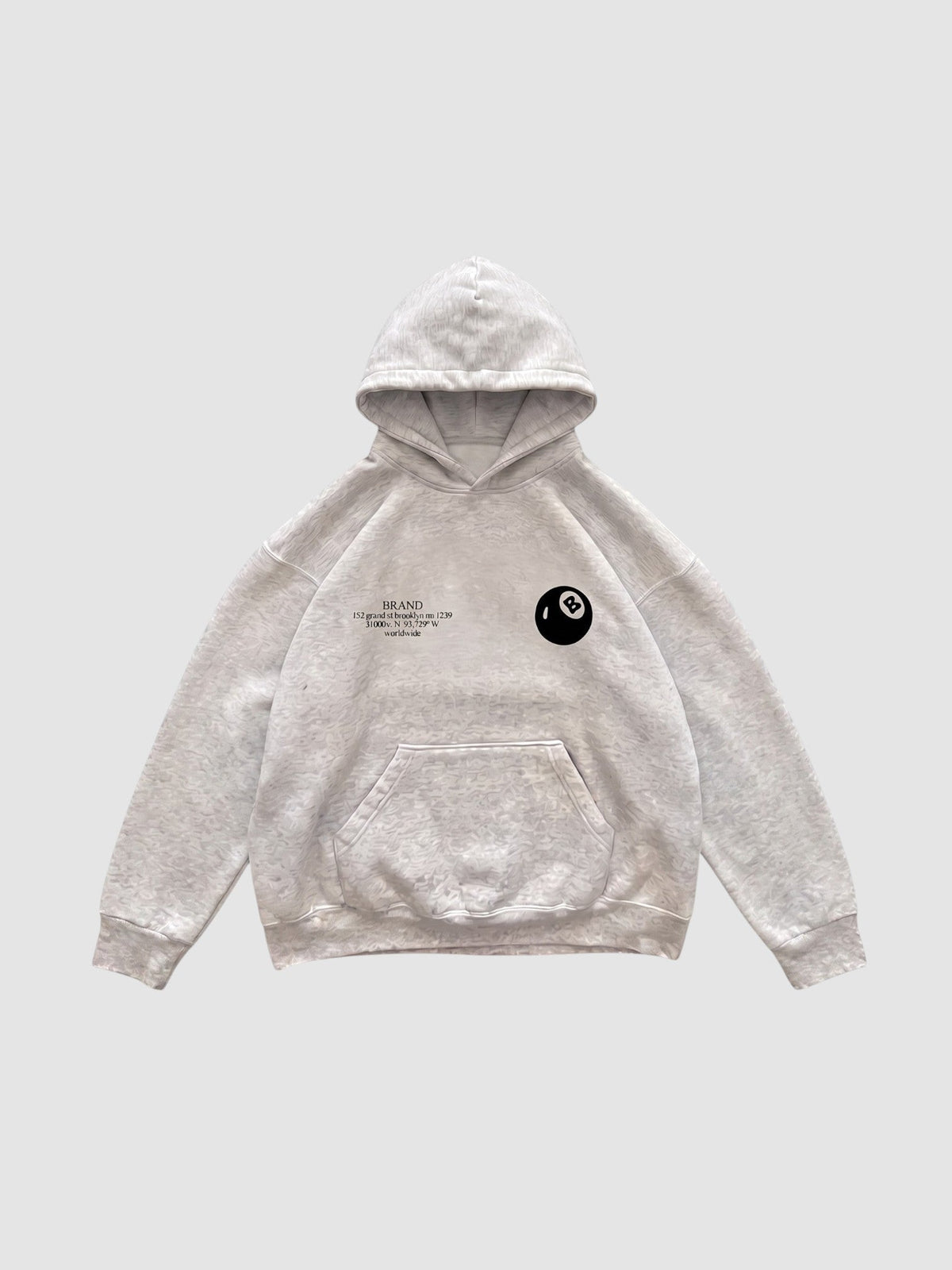Y2K Studio grey boxy hoodie with a small 8-ball graphic and text on the chest, featuring a kangaroo pocket.
