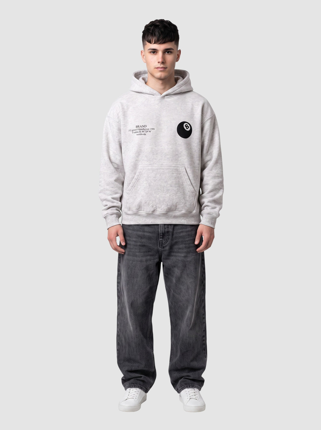 Y2K Studio grey marl boxy hoodie with 8 ball chest logo and kangaroo pocket worn by a man with dark jeans