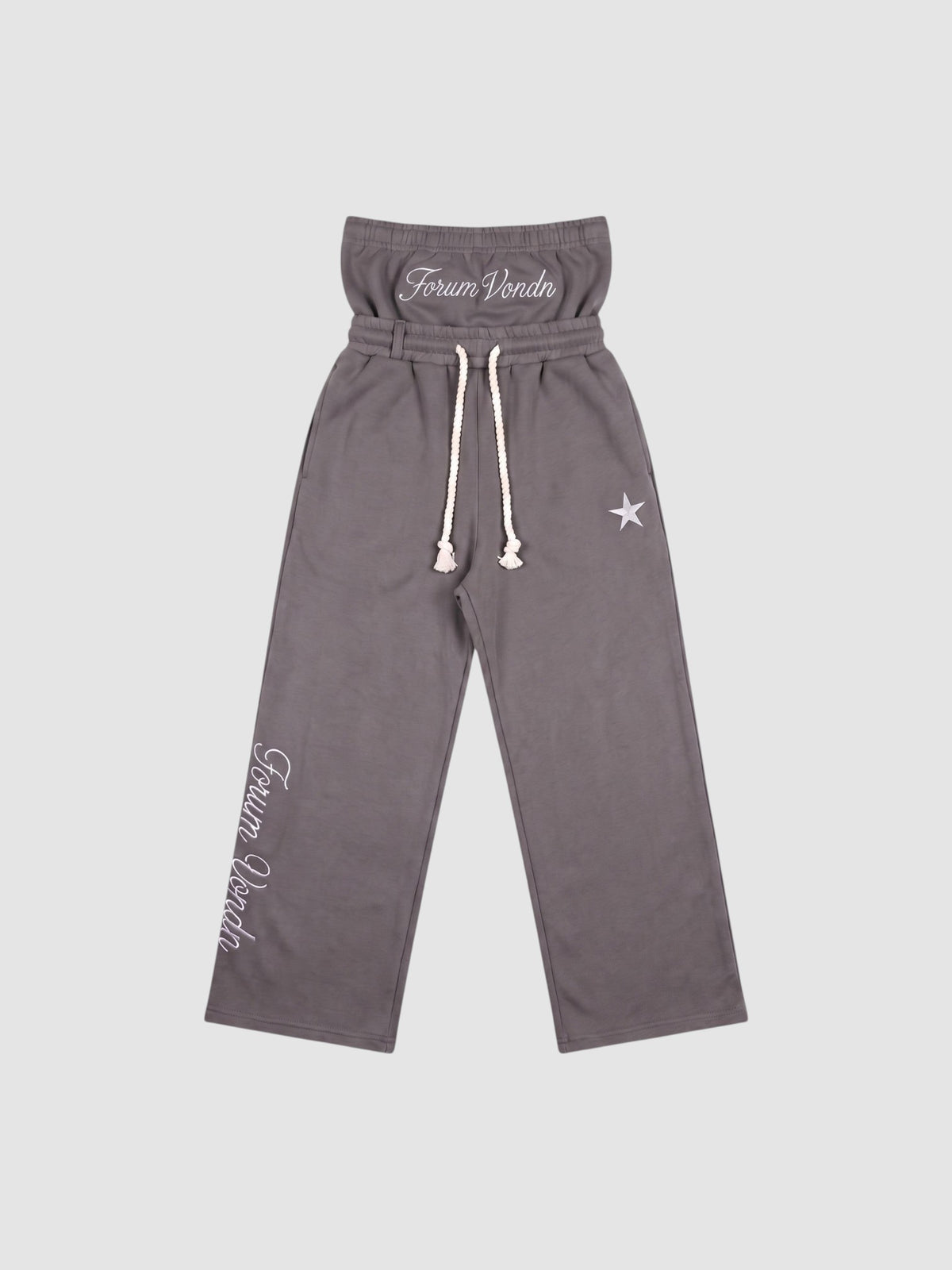 Y2K Studio grey double waist jogging pants with gothic embroidery, star detail, and braided drawstring.