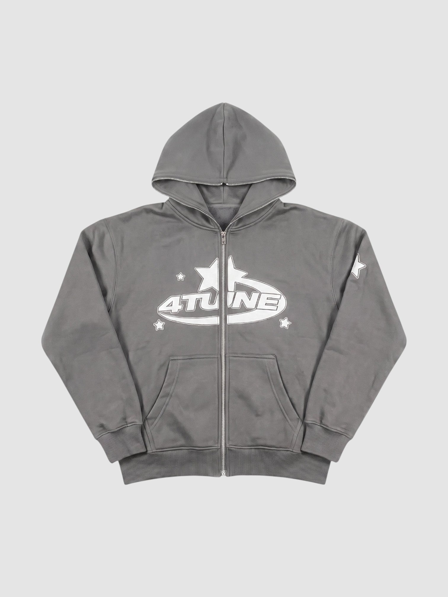 Y2K Studio grey zip-up hoodie with white star graphic lettering and kangaroo pockets in a relaxed Y2K aesthetic