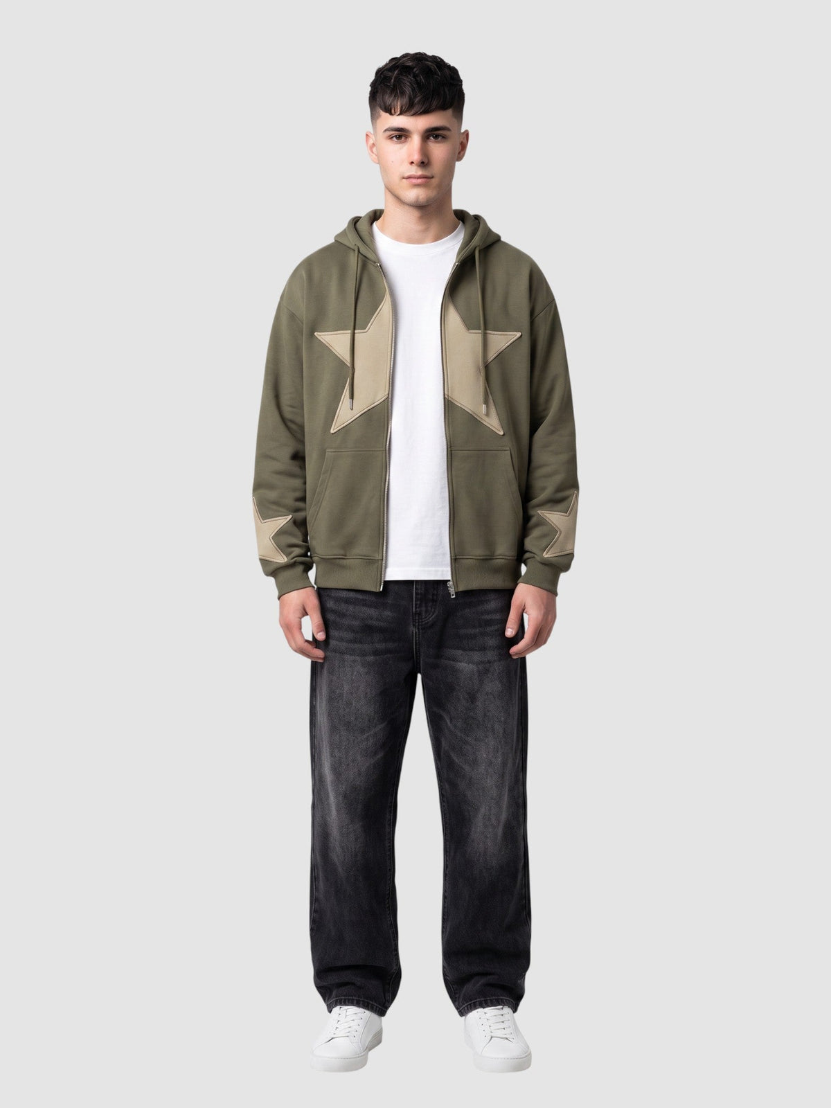 Y2K Studio khaki zip-up hoodie with a large beige stitched star patch on the chest and small stars on the cuffs.