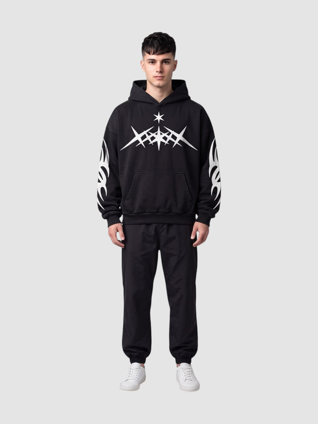 Y2K Studio oversized black washed hoodie with white flame and star graphics, featuring a kangaroo pocket and hood.