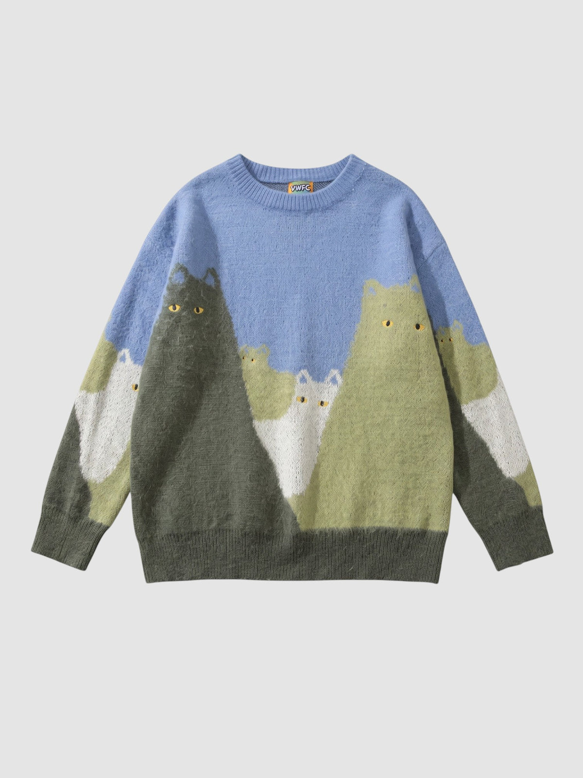 Y2K STUDIO oversized knit sweater featuring a blue, green, and grey cat pattern with yellow eyes and a crew neck.