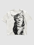 Y2K Studio white oversized t-shirt featuring a black halftone cat portrait print with a ribbed crew neck