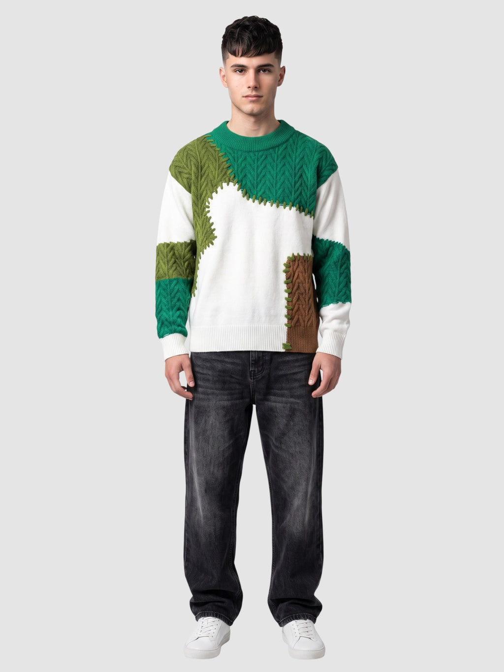 Y2K Studio patchwork knit sweater featuring green, brown, and off-white textured panels with decorative stitching.