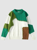 Y2K Studio patchwork knit sweater featuring emerald green, olive, and brown textured panels on an off-white base.