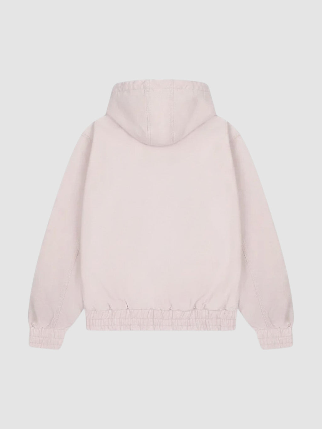 Back view of Y2K Studio Sakura jacket in faded powder pink cotton with a boxy fit and elasticated ribbed hem