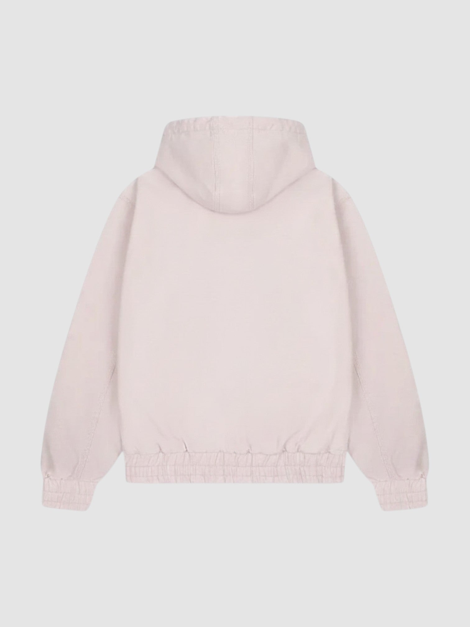 Back view of Y2K Studio Sakura jacket in faded powder pink cotton with a boxy fit and elasticated ribbed hem
