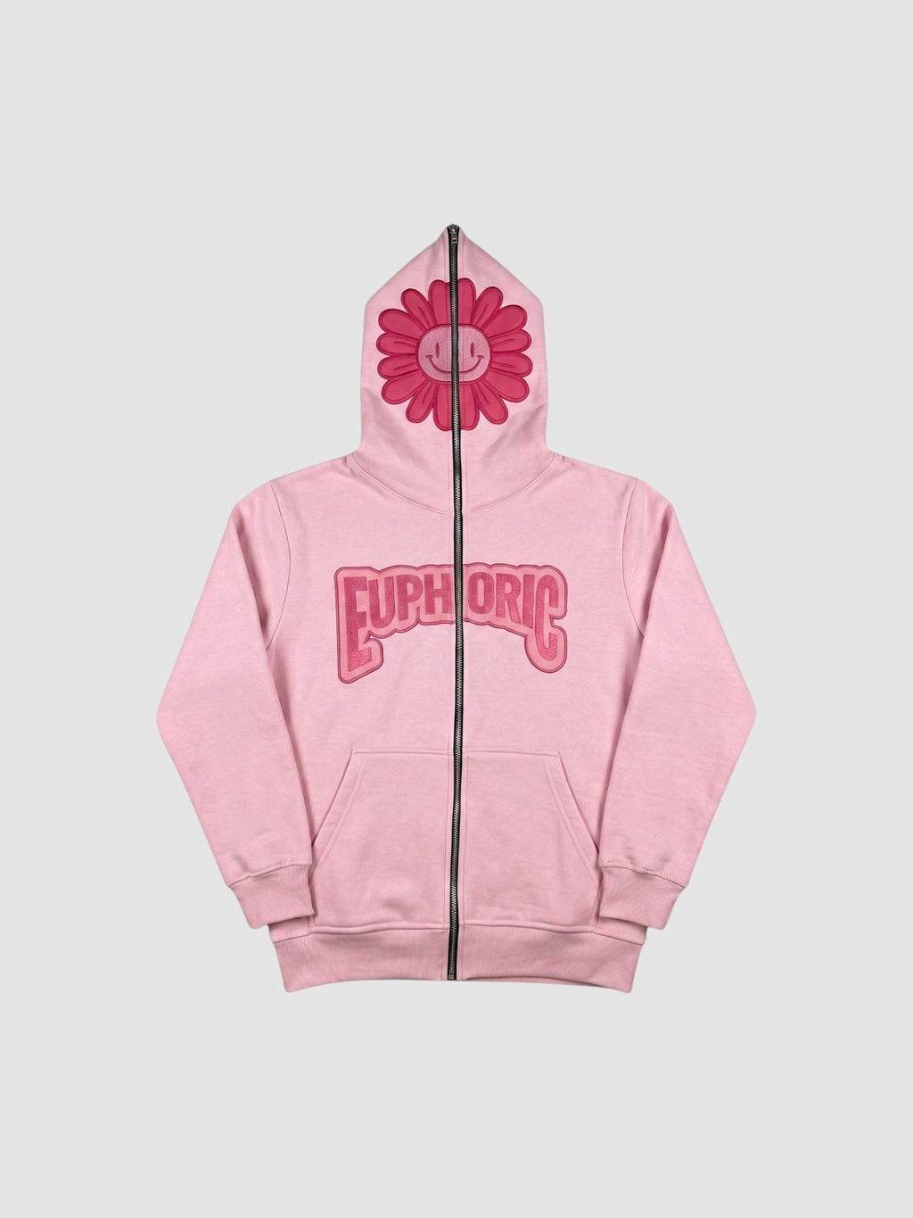 Y2K Studio pale pink zip-up hoodie featuring a dark pink smiley flower on the hood and bubble lettering on the chest.