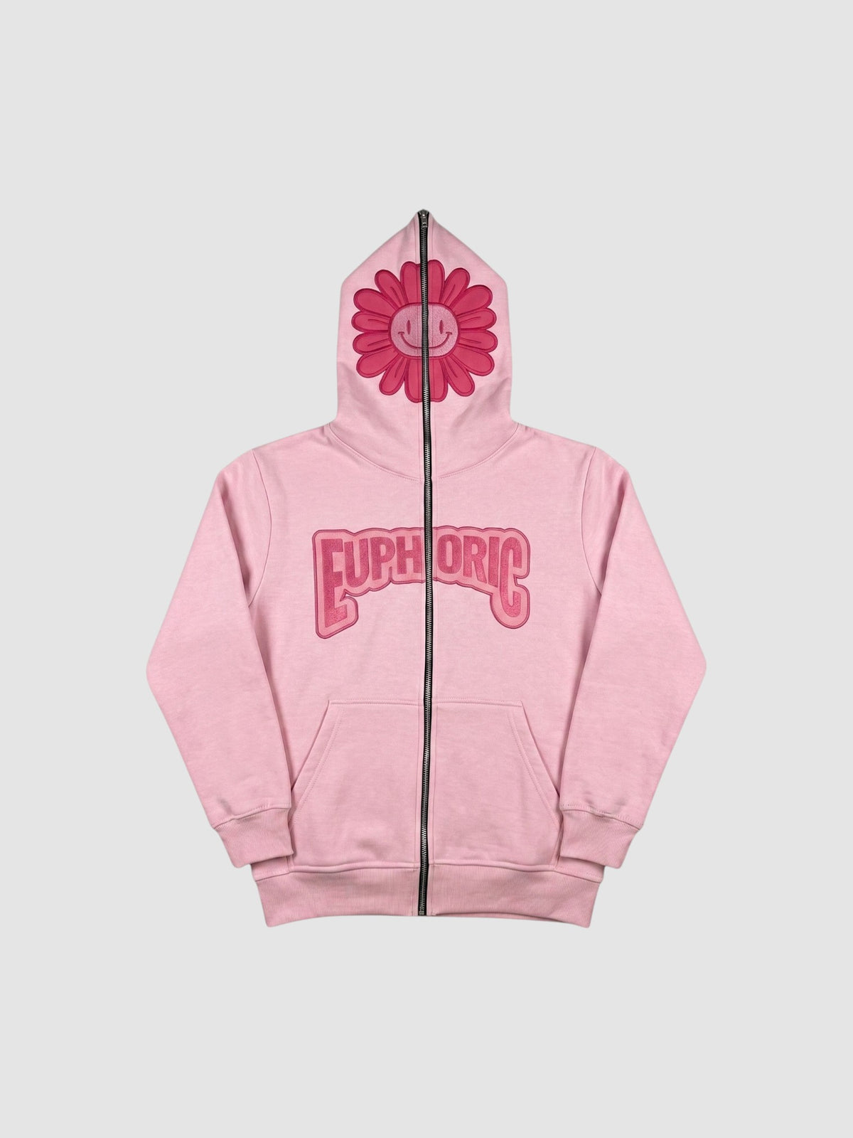 Y2K Studio pale pink zip-up hoodie featuring a dark pink smiley flower on the hood and bubble lettering on the chest.