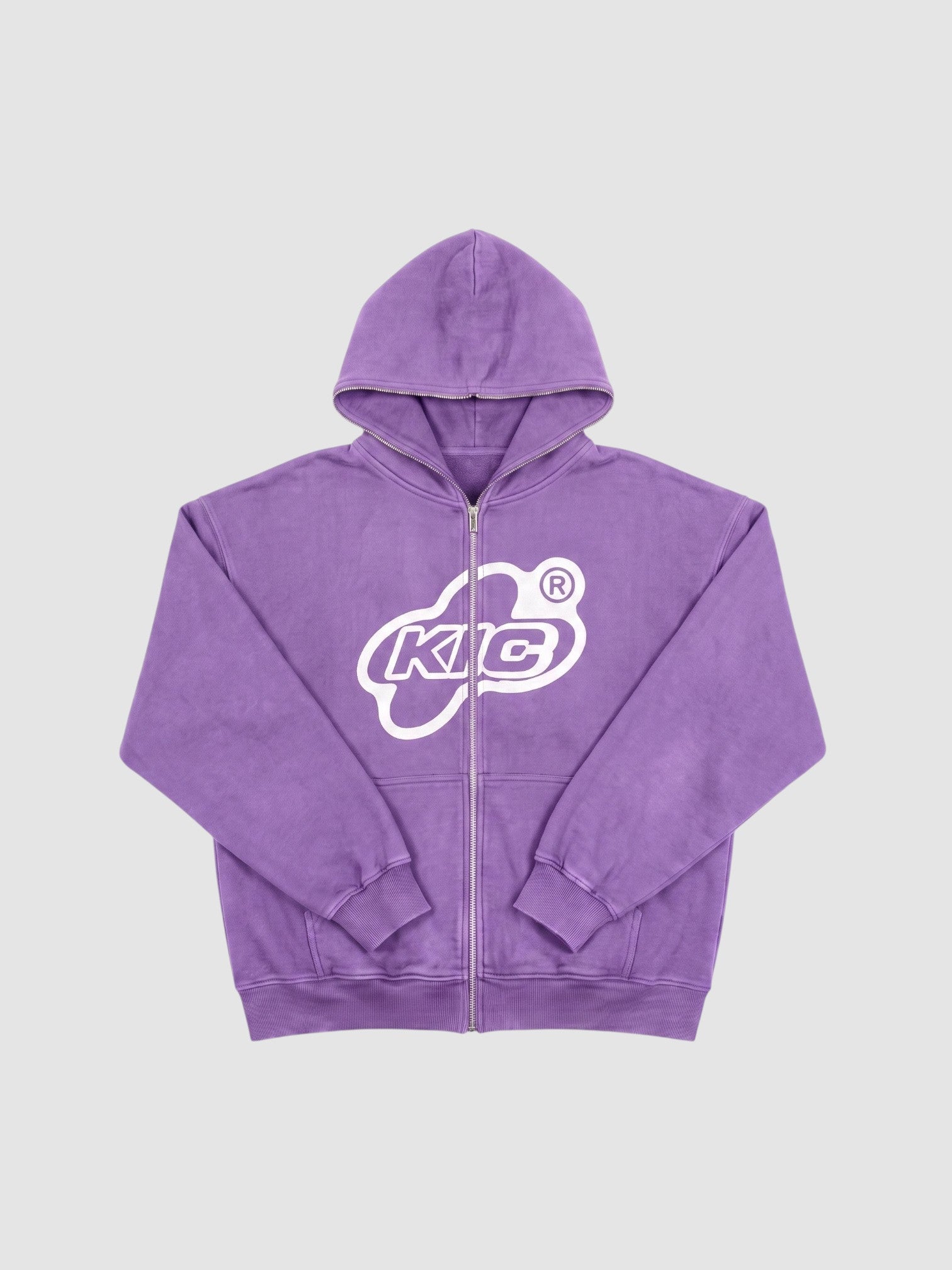 Y2K Studio purple zip-up hoodie with white bubble logo graphic and oversized fit on a white background