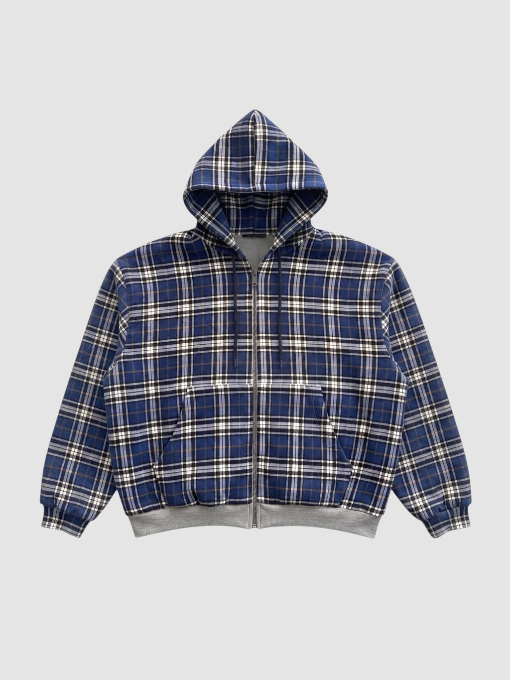 Y2K STUDIO reversible zip-up hoodie featuring a blue, white, and black tartan plaid pattern with ribbed cuffs.
