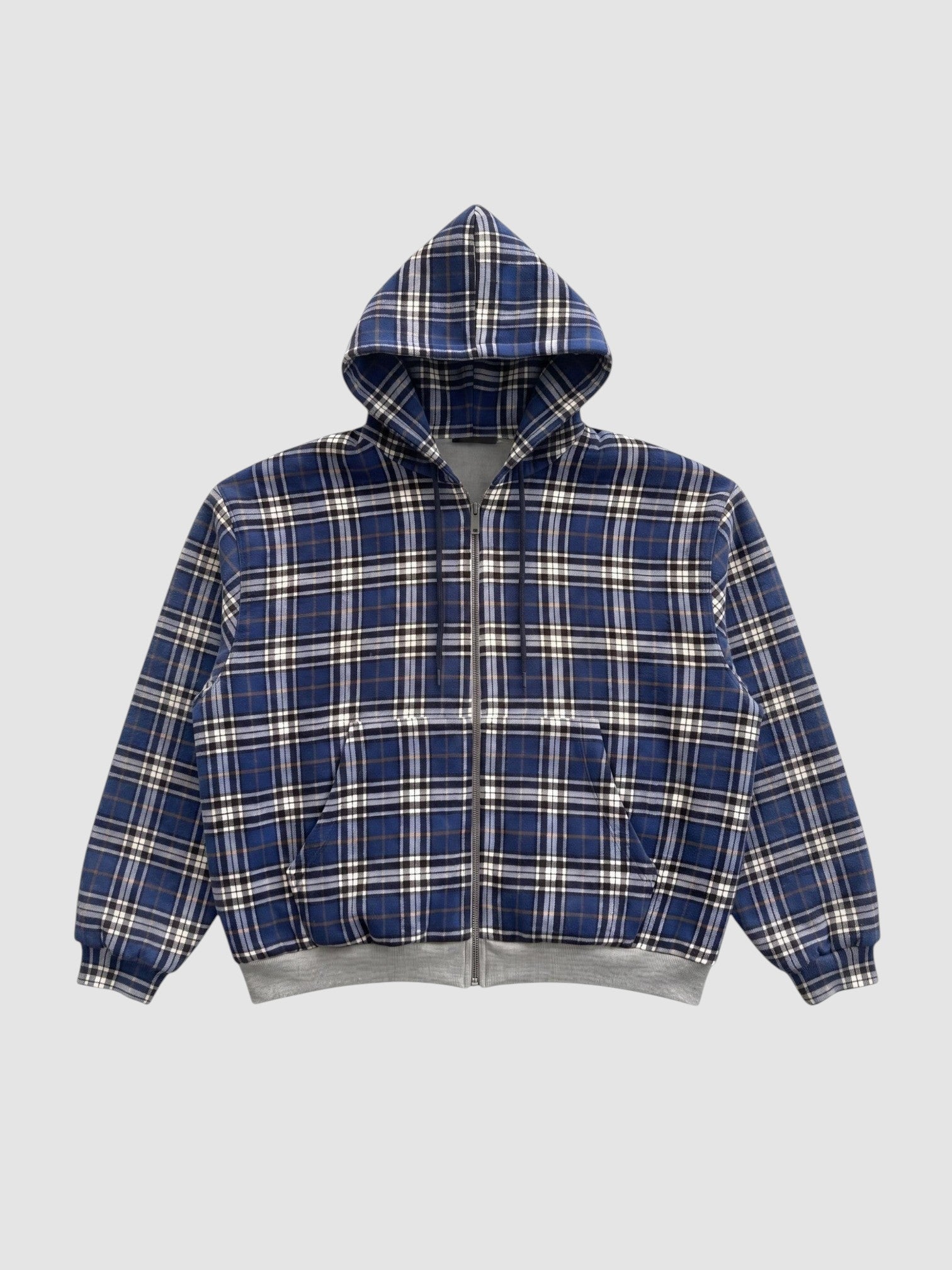 Y2K STUDIO reversible zip-up hoodie featuring a blue, white, and black tartan plaid pattern with ribbed cuffs.