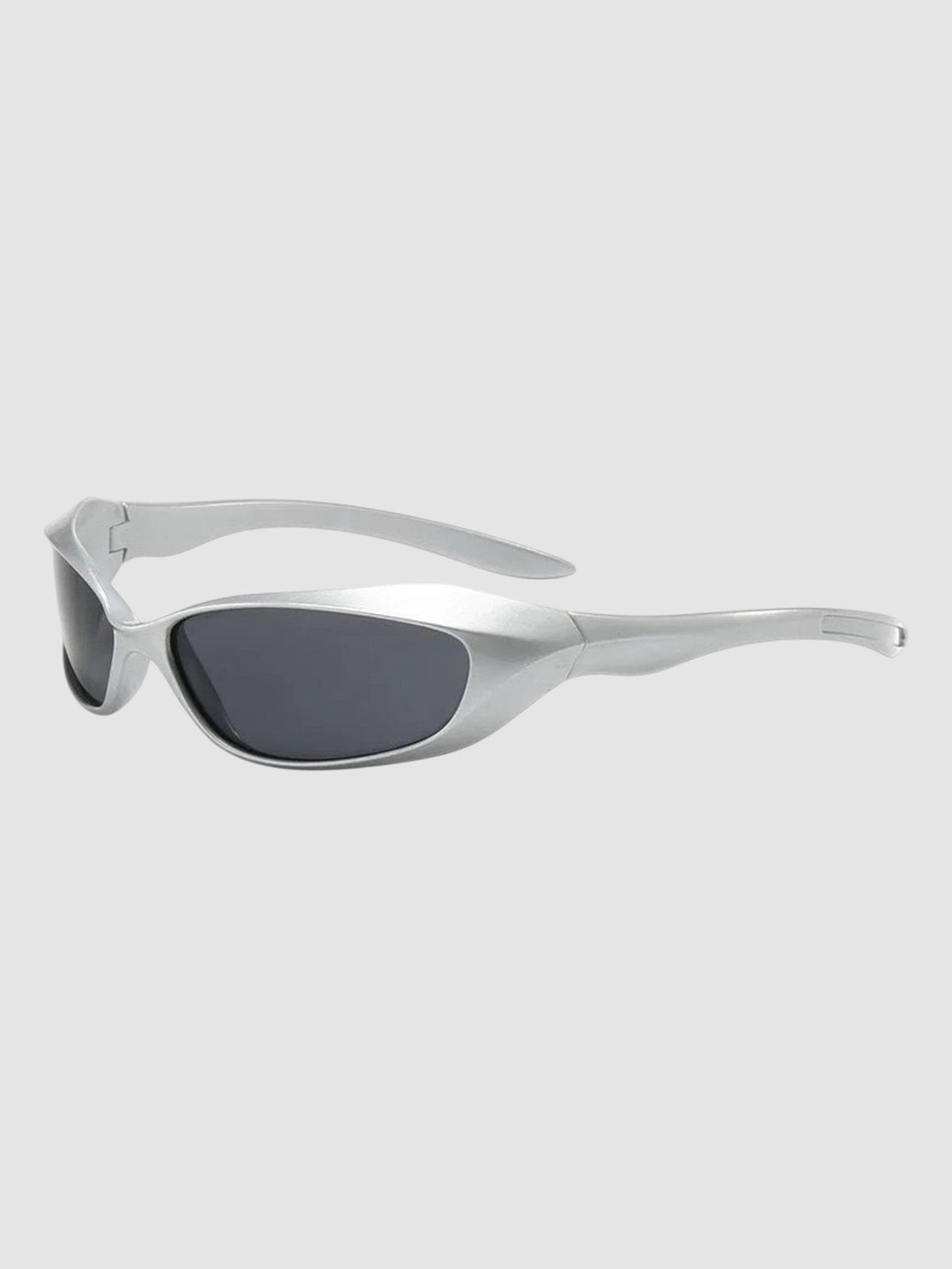 Y2K Studio futuristic silver wraparound sunglasses with dark tinted lenses and a metallic polycarbonate frame.