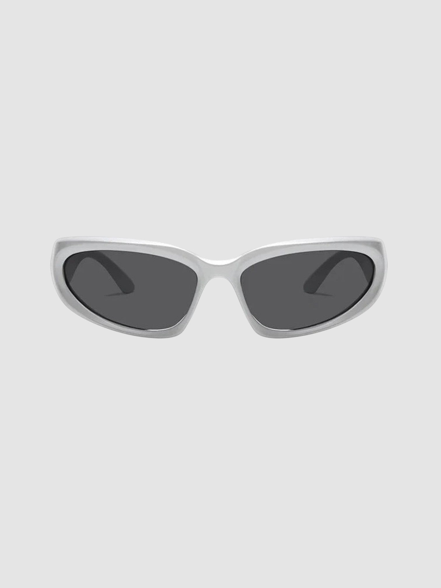 Y2K Studio silver gorpcore wraparound sunglasses with dark grey tinted lenses for a technical outdoor look.