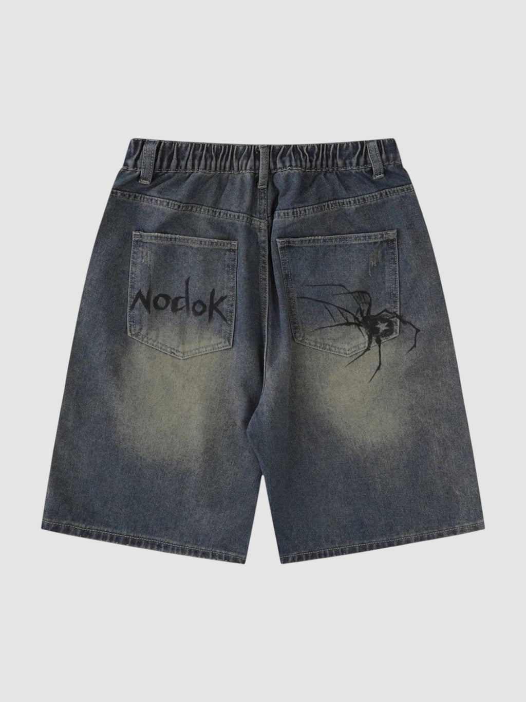 Y2K Studio blue denim jorts with spider graphic on the back pocket and graffiti style text on the other pocket