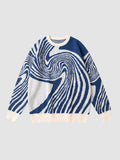 Y2K STUDIO long-sleeve knit sweater featuring a navy blue and off-white spiral swirl pattern with ribbed trim.