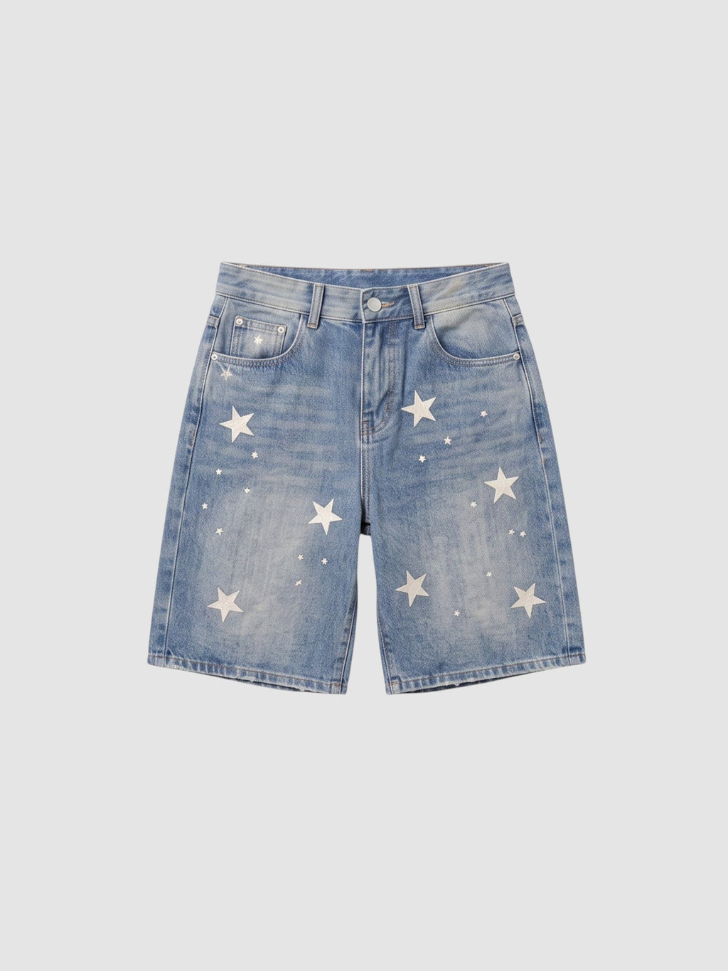 Y2K Studio high-waisted light blue denim jorts featuring scattered white star prints and a relaxed straight-leg fit.