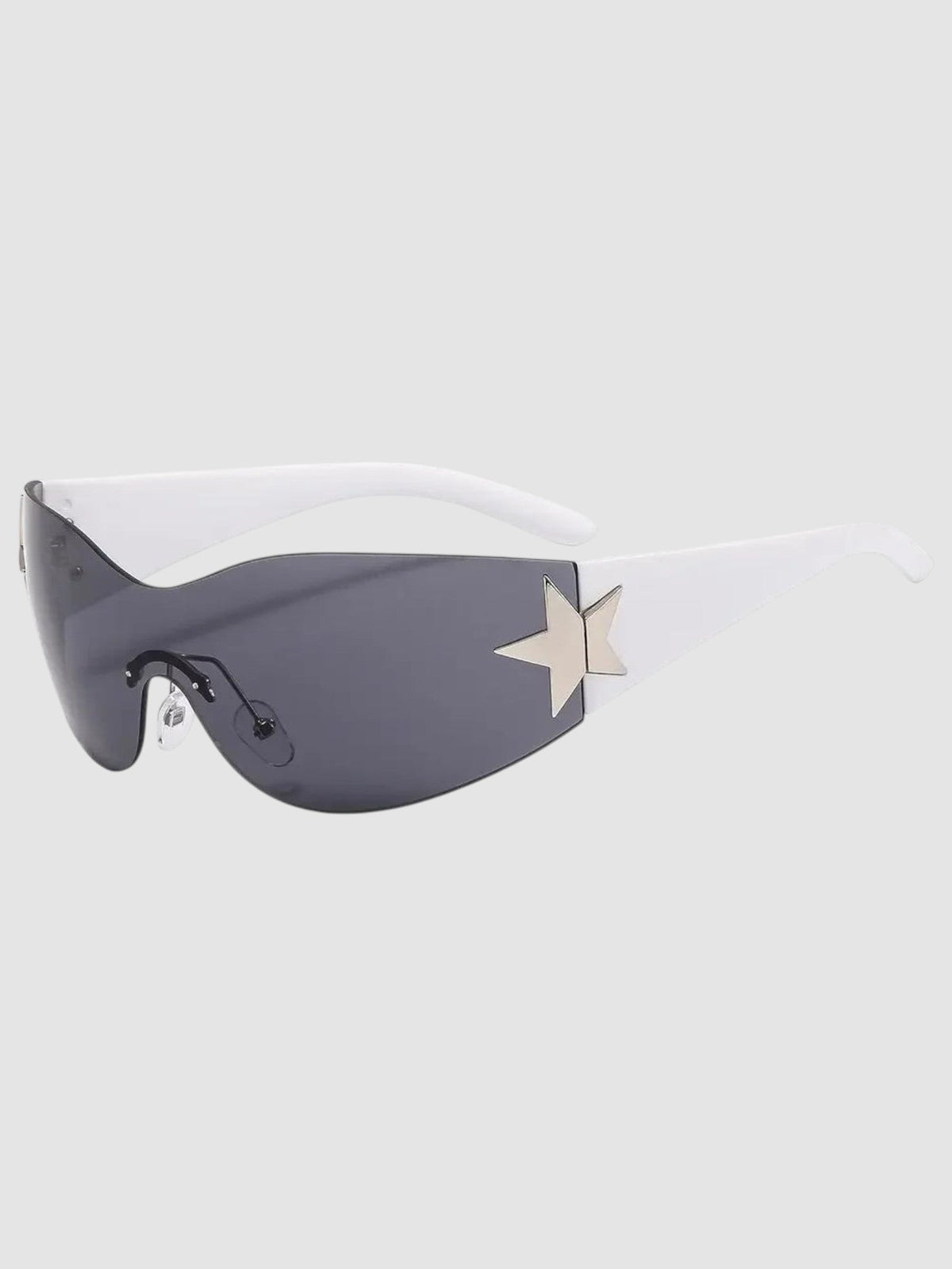 Y2K Studio star-embellished wraparound shield sunglasses with dark grey lenses and white temples in a Y2K style.