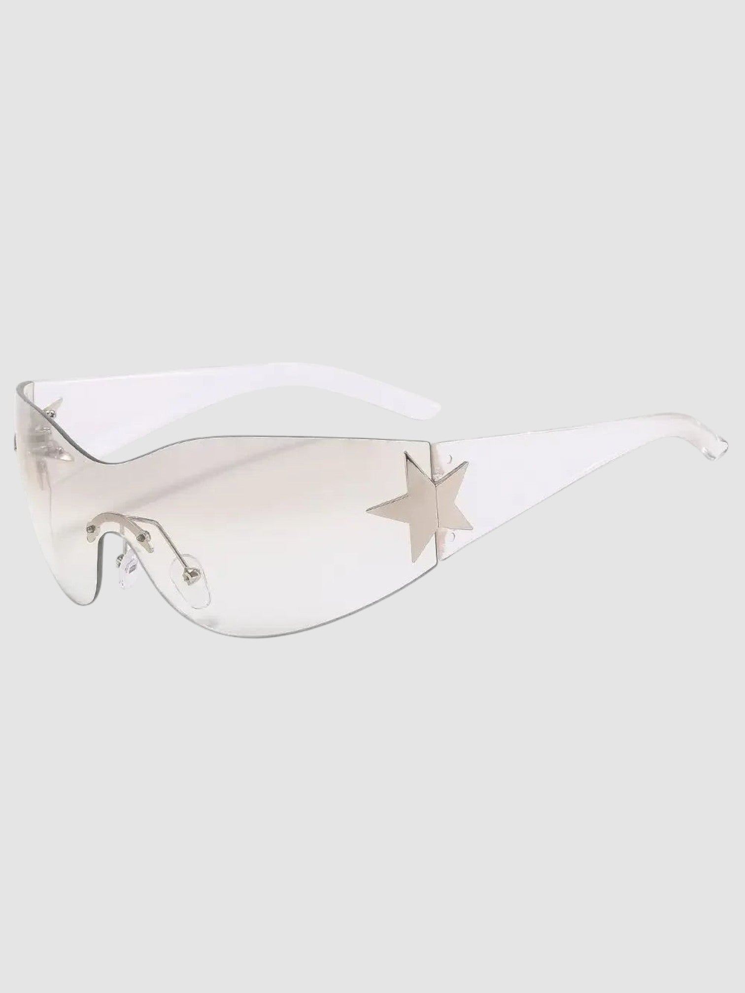 Y2K Studio Y2K star shield sunglasses with a frameless gradient lens and silver star detail on clear temples