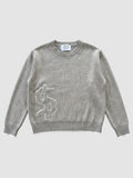 Y2K Studio taupe grey cotton knit sweater with a gothic dollar sign applique and white-tipped ribbed hem and cuffs.