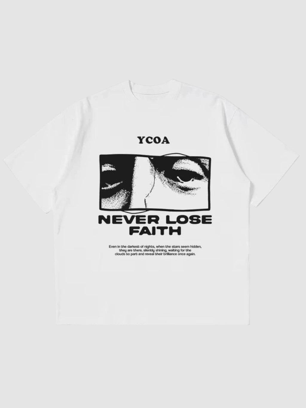 Y2K Studio white oversize t-shirt with Never Lose Faith graphic print featuring eyes and bold typography