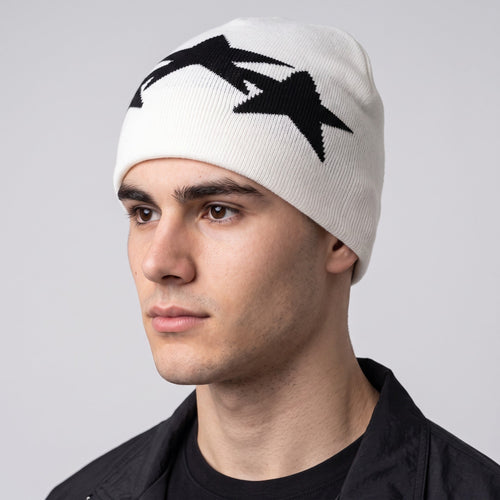 Y2K STUDIO white knit beanie with black geometric star pattern worn by a man for a casual winter look