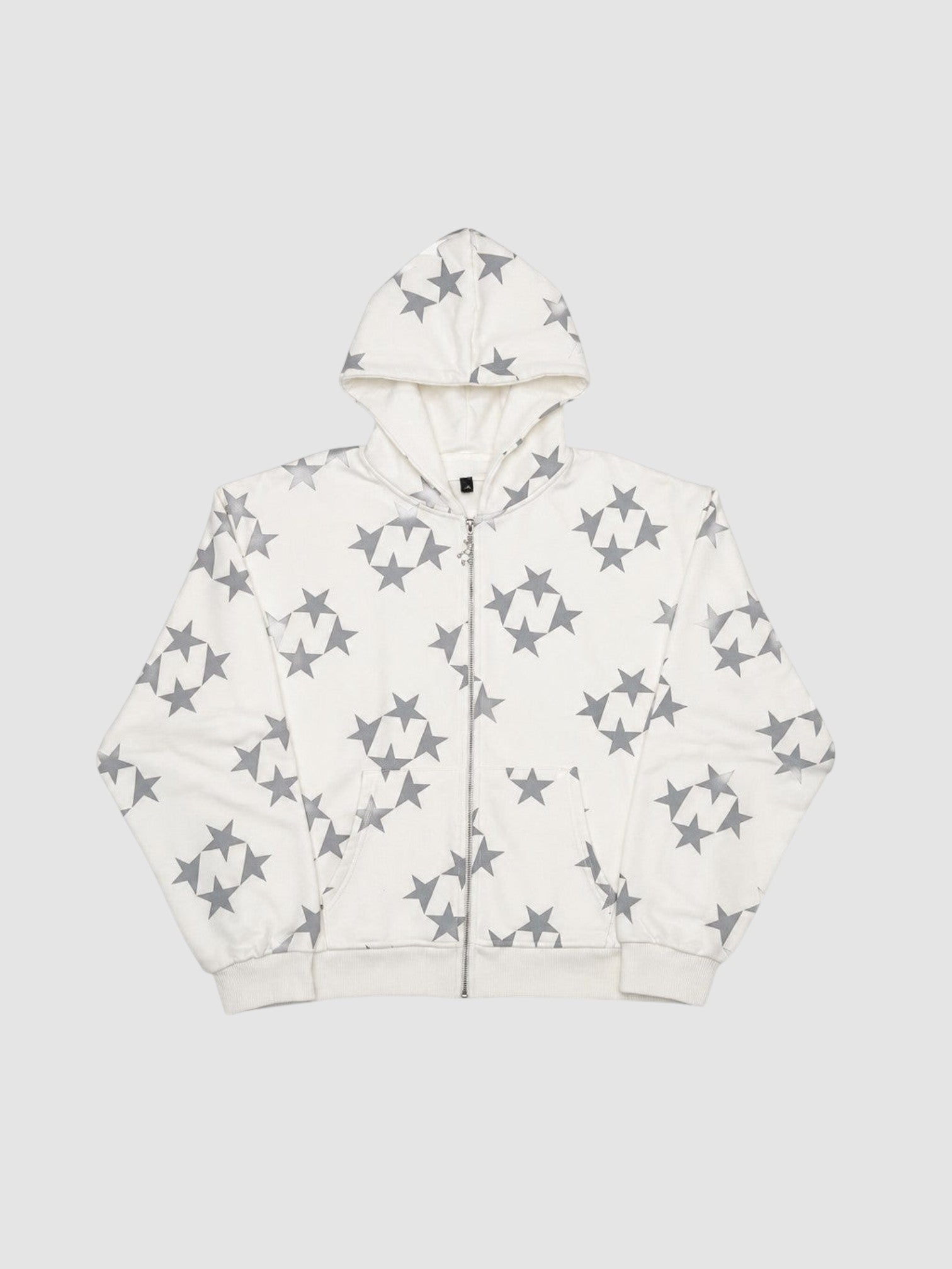Y2K Studio zip-up hoodie in white with an all-over grey star pattern, featuring a hood and front pockets.