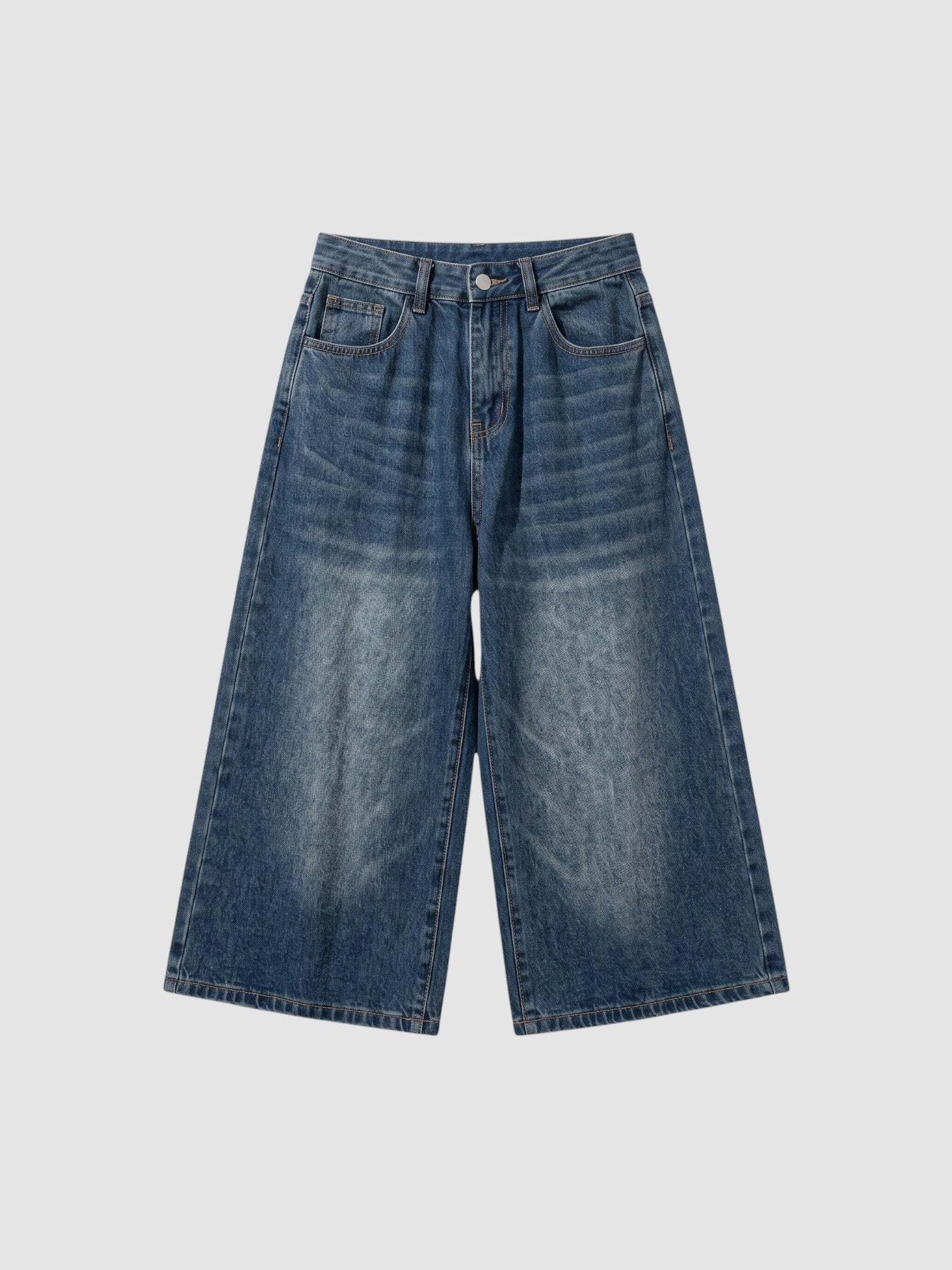 Y2K Studio high-waisted wide-leg denim bermuda shorts in a vintage-washed blue finish with a button fly closure.