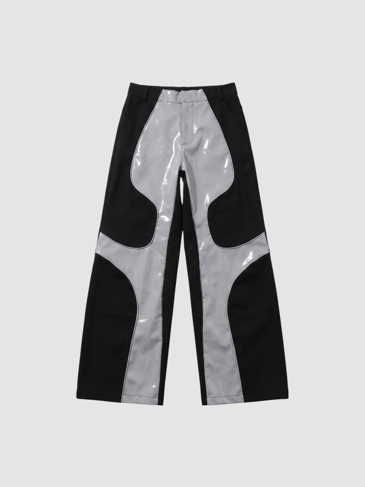Y2K STUDIO wide leg faux leather trousers in black and glossy light grey with wavy wave-cut panel detailing.