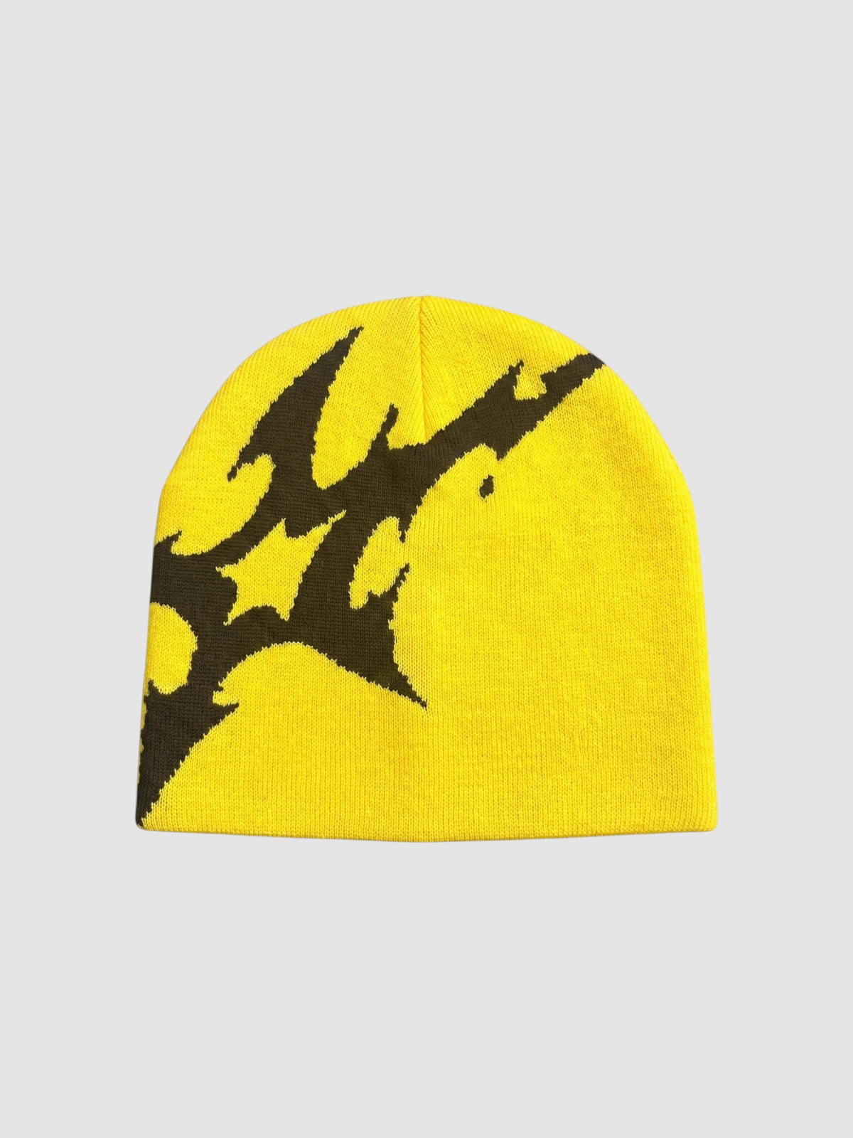 Y2K Studio yellow acrylic beanie with a bold black asymmetrical lightning bolt graphic on the side